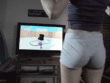 Playing Wii Fit in sexy tight Hotpants_6022e90767432.gif