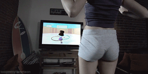 Playing Wii Fit in sexy tight Hotpants_6022e90767432.gif