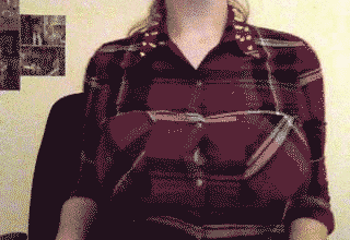 Busty Lady Rips Her Shirt Off in an Interesting Way_619da4b67702d.gif