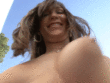 Cheerful Girl Shaking Her Big Tits in the Open_6193bf6b5198a.gif