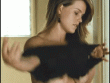 Girl with big tits wears a top_6908eb35bb466.gif