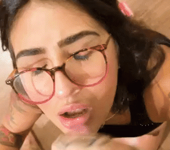 Facial cumshot for brunette with glasses_6a29a47186218.gif